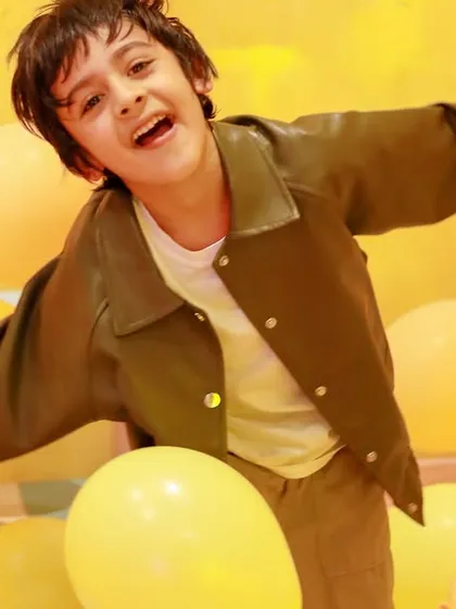 Feeling free and joyful in a sea of balloons. Sometimes the simplest things bring the biggest smiles.