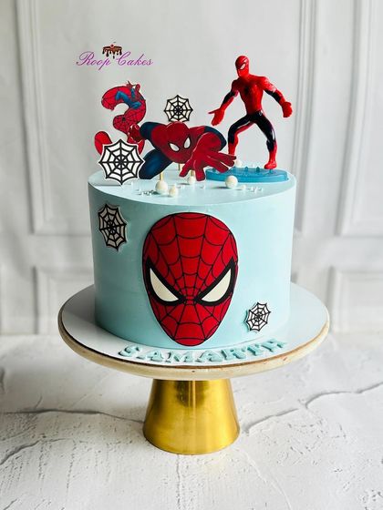 Another look at my popular Spider-Man cake design. This one was made for Samarth's birthday, featuring the iconic mask, spider webs, and action-packed character toppers.
