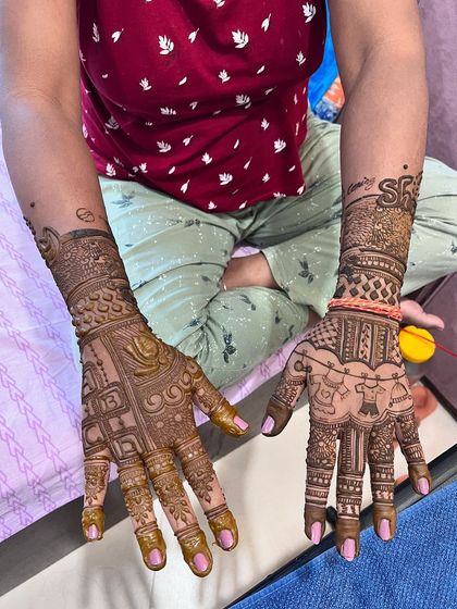 Another view of the personalized baby shower design, showing the custom initials and motifs.