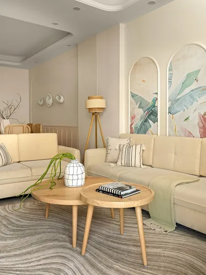 This living room from Casa Levante is designed to feel like a sanctuary. Soft, neutral sofas are complemented by arched wall panels with hand-painted botanical murals, bringing an artistic and calming touch to the space.