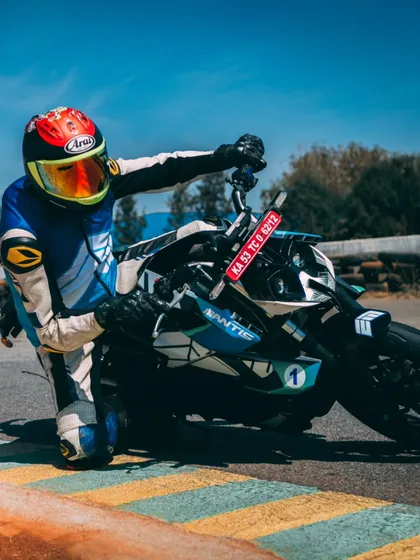 Another shot of me cornering on an electric race bike. Proper body position is just as crucial on an EV as it is on any other motorcycle.