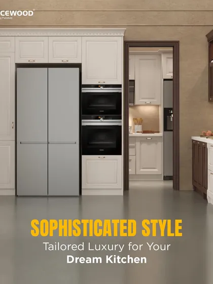 Here, I've tailored a classic design for a sophisticated, luxurious feel. The off-white panelled cabinets fully integrate the refrigerator and double ovens, creating a seamless wall of storage that is both grand and highly functional.