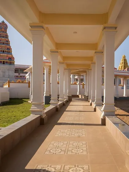 I believe architecture should guide the user's experience. This colonnaded walkway at the Shiva Temple complex is part of the 'parivarthana patha' or transitional path, designed to create a sense of peace and anticipation as devotees move through the sacred space.