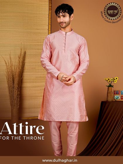 Attire for the throne. This pink silk blend kurta has a beautiful sheen and a subtle texture, making it a regal choice for any festive event. The fit is classic and comfortable.
