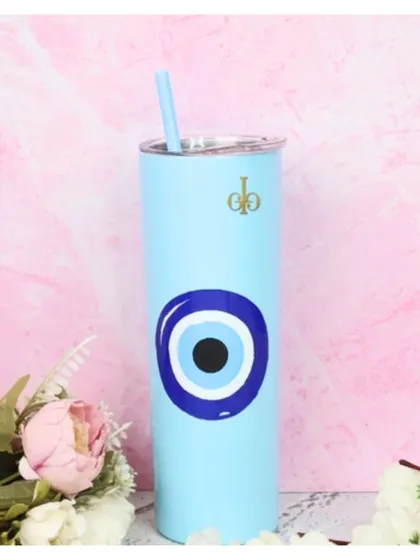 A sleek, skinny tumbler in light blue featuring a protective evil eye design. It comes with a matching reusable straw.