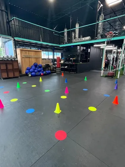 The calm before the storm. The training floor is set up with cones and markers for an intense session of fitness and drills.