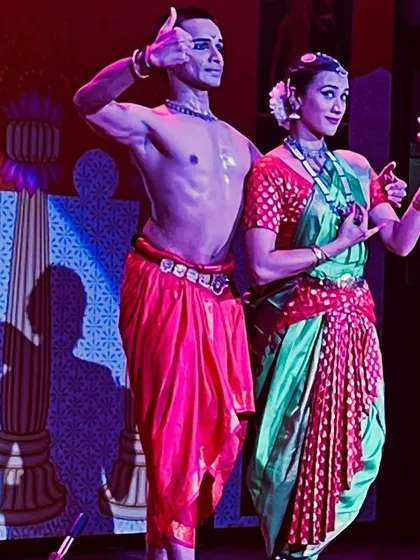 A playful and interactive pose with my dance partner Adithya P.V. during the "Divya Vivaaham" performance. This shows my experience in duet choreography and creating chemistry on stage.