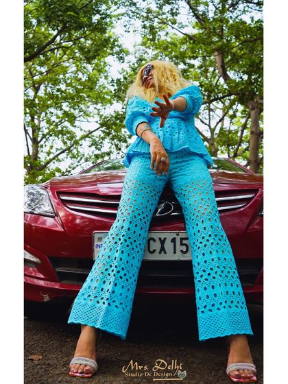 A powerful pose in a custom sky-blue chikankari co-ord set. This outfit is all about making a statement with confidence and style.