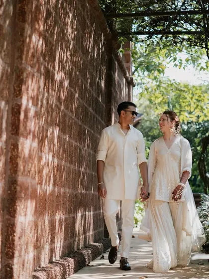 For their Haldi, we chose a sophisticated all-ivory theme. It was a unique twist that stood out beautifully against the vibrant decor, reflecting the couple's elegant style.