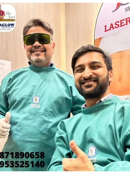 A comfortable and positive experience is central to what we do. Here, a satisfied client gives a thumbs-up alongside our specialist after a session, reflecting the safe and reassuring environment we cultivate at our clinic.