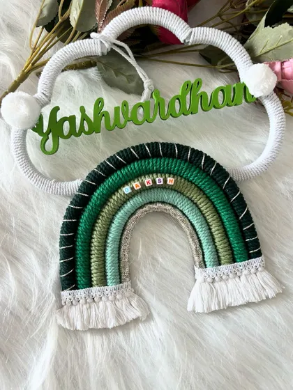 A clear and bright photo of the 'Yashwardhan' name hanging, perfect for seeing all the fine details.