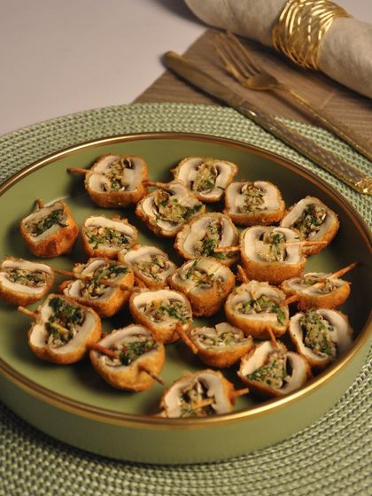 My Mushroom Duplex is a crowd favorite. These are savory stuffed mushrooms, crumb-fried to perfection and served as an elegant pass-around snack that is both delicious and easy for guests to enjoy.