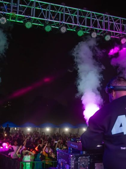 Facing a sea of students at RGIT, with smoke cannons adding to the atmosphere. My 'Error 404' shirt is a nod to losing yourself in the music.