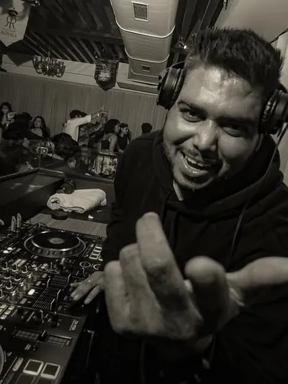 A black and white shot that captures the raw energy and connection with the crowd. It's all about the vibe.