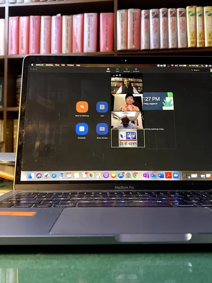 The legal world has embraced digital transformation. Here I am during a virtual interview, a common practice now for court hearings, client meetings, and media interactions, allowing me to connect and work seamlessly from my office.