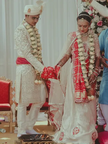 A duplicate of the couple during the phera ceremony.