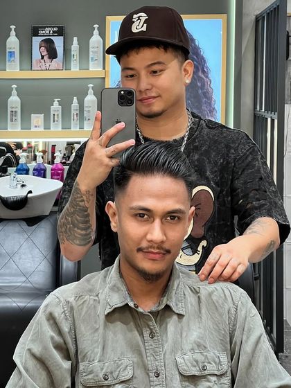 A before and after of a men's haircut. A good cut can completely transform your look, giving you a fresh and confident edge.