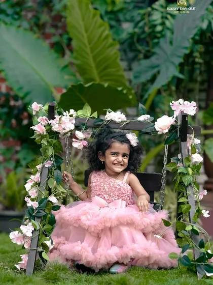 Every little girl is a princess. We captured this beautiful smile on our floral swing in the garden, creating a perfect fairytale moment.