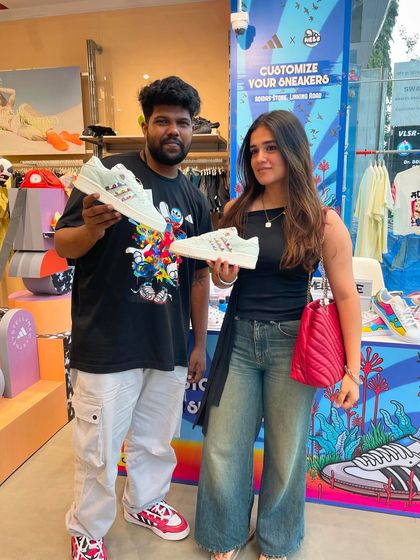 Another satisfied customer with her newly customized sneakers. Our live events are all about creating these positive, personal brand interactions.