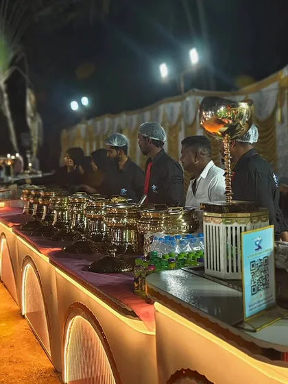 A wide view of our illuminated buffet counter at the outdoor OPPO event, ready to serve hundreds of guests.