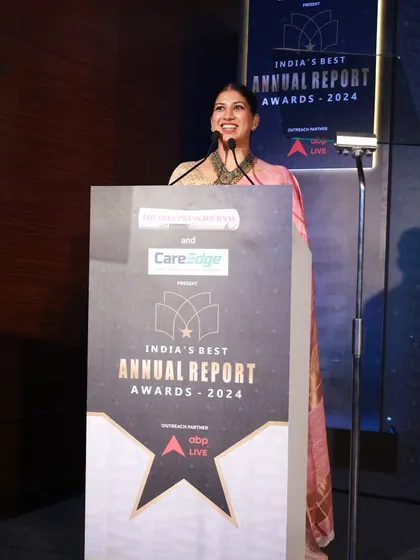 Poised and prepared at the podium for India's Best Annual Report Awards 2024. For formal corporate events, my focus is on delivering a sharp, articulate, and sophisticated experience that honors the gravity of the occasion.