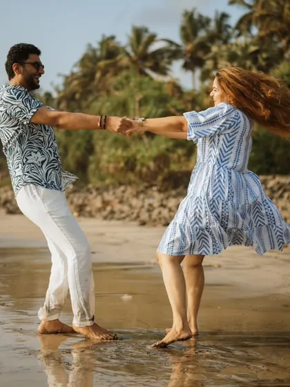 Pre-wedding shoots should also be about fun. I encourage my couples to let loose, laugh, and just be themselves. This shot, filled with movement and joy on the beach, perfectly captures that carefree spirit.