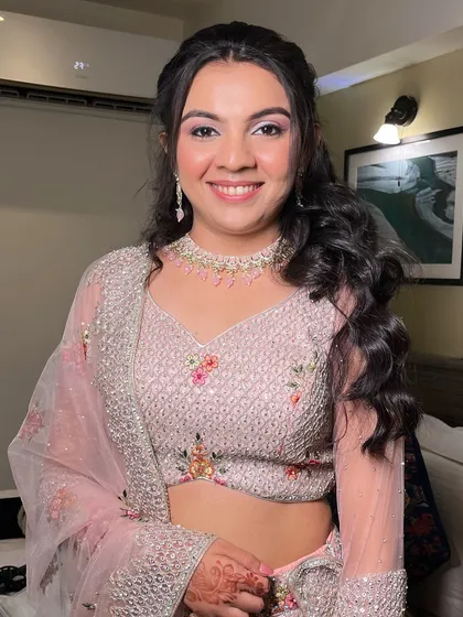 A lovely soft glam look for an engagement party. The pink and purple tones on the eyes add a touch of modern romance, paired with a dewy skin finish.