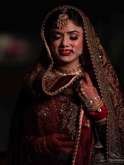 My pretty bride Anjali, looking so shy and beautiful. The details on her velvet lehenga are stunning.