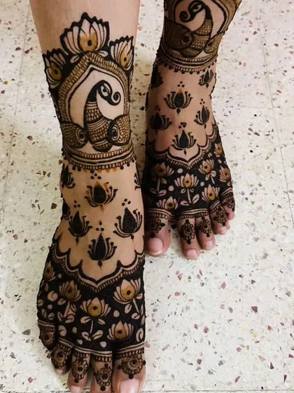 A beautiful combination of peacock and lotus motifs for the feet. The pattern is so graceful and symbolic.