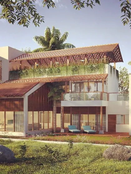 For this upcoming residence in Bangalore, we embraced a vernacular approach with sloped tile roofs and layered green terraces. The design is carefully sited to overlook a neighborhood lake, making the natural view an integral part of the home.