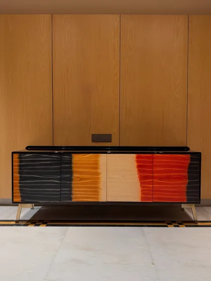 We love to experiment, and this ombré console is one of our favorite creations. The gradient stain on White Ash wood, paired with a sleek piano black body, creates a stunning statement piece that is both artistic and functional.