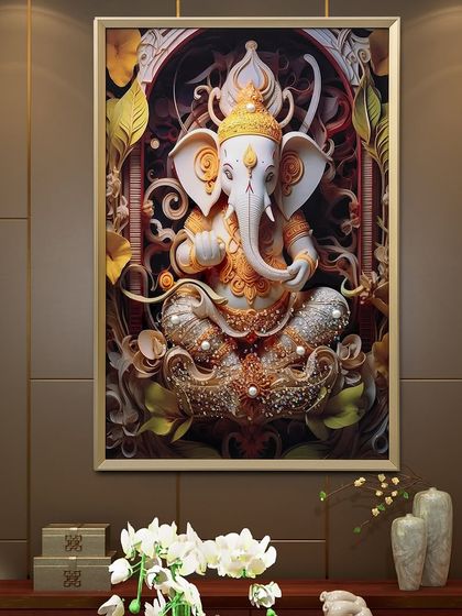 This crystal glass painting of Lord Ganesh is depicted in a tranquil and majestic pose. The intricate details, from the crown to the robes, are embellished with crystals that enhance the spiritual and aesthetic appeal of the artwork.