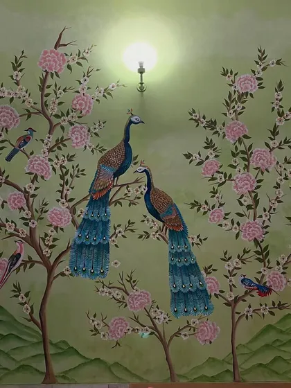 The full view of the peacock and cherry blossom mural, creating a serene and beautiful feature wall.