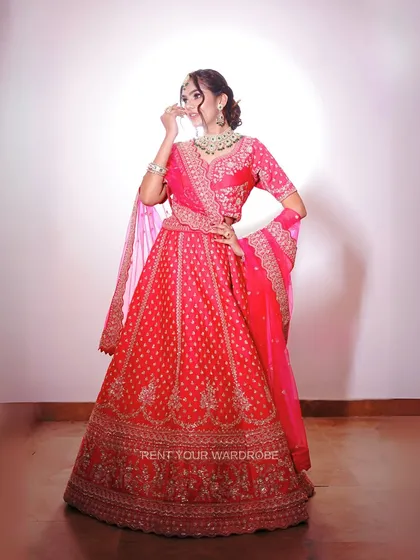 The complete look with our vibrant pink lehenga. This outfit is designed to make a statement and is a favorite among makeup artists for their shoots.