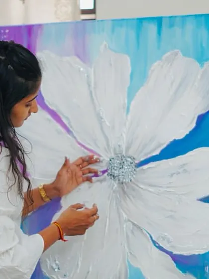 Adding the final shimmering details to a piece from my "Let it Blossom" series. The raised, textured petals catch the light beautifully, and the silver leaf center adds a focal point. This series is about finding beauty in vulnerability.