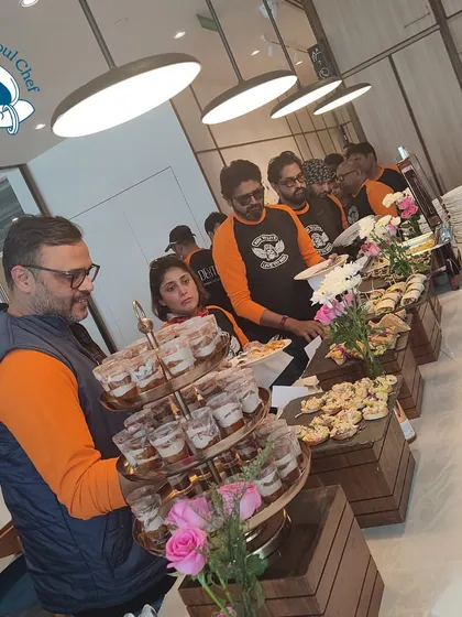 A wide shot of the bustling buffet line at Dextrus. My team ensures the spread is always well-stocked and beautifully presented, even during peak service times.