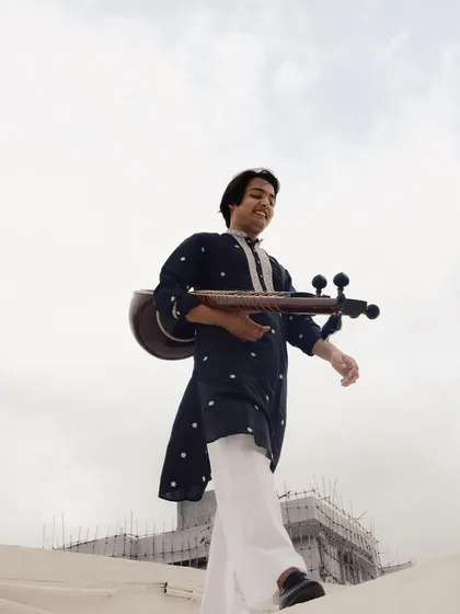 Walking on the rooftop during the "Rang Morla" shoot. Even with my fear of heights, we got the shot!