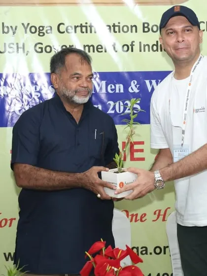 Another judge is honored for his time and wisdom, which helped uphold the true spirit of yogasana at our competition.