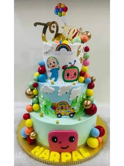 I create magical, multi-tiered cakes for kids' birthdays, like this vibrant three-tier Cocomelon cake. It's designed to be a joyful centerpiece, and like all my cakes, it's 100% eggless.