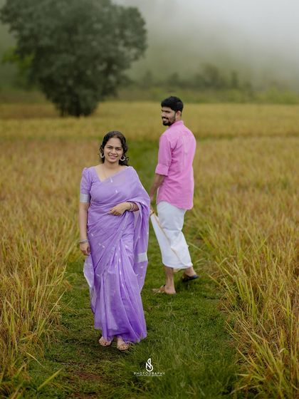 A playful glance back at the camera while walking through the field. This creates a fun and engaging photograph.