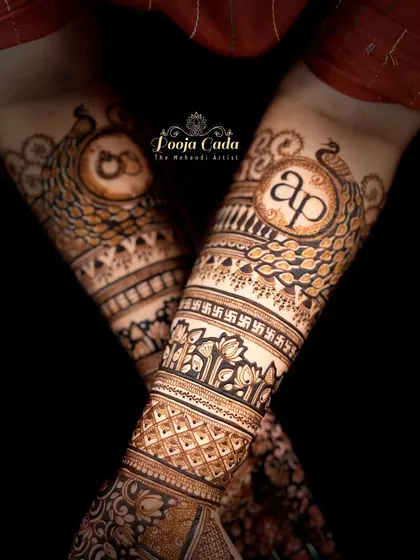 Mark your engagement with a design that's uniquely yours. This piece features the couple's initials "AP" in a beautiful monogram, surrounded by intricate peacock motifs and traditional patterns, symbolizing a new beginning.