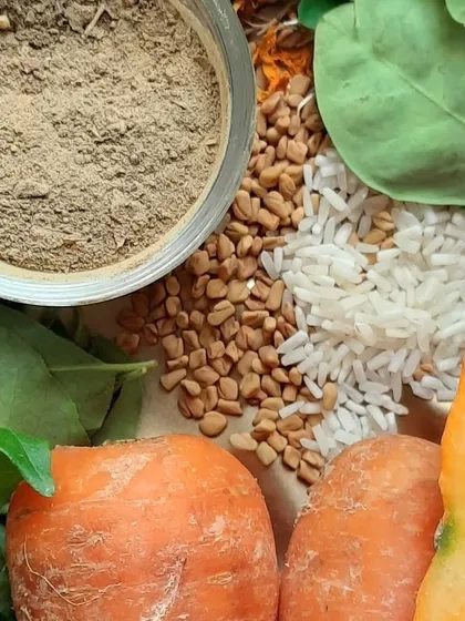 A glimpse into my pantry. You can see herbal powders, fenugreek seeds, rice, fresh carrots, and curry leaves, all of which I use in various skin and hair care recipes.
