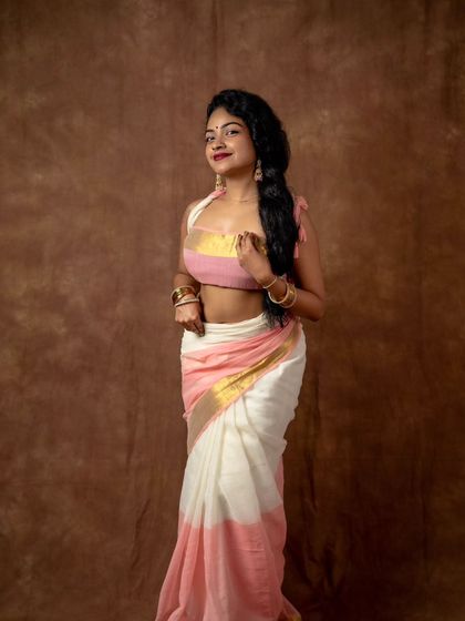 A full view of my experimental drape. This look combines a traditional saree with a modern, bandeau style pallu, showing how versatile draping can be.