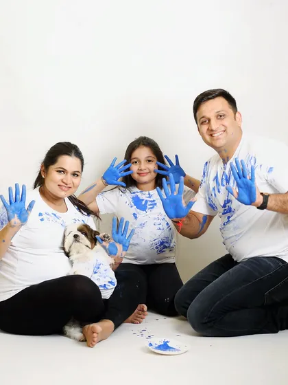 The final shot from a fun paint-based gender reveal. This family, complete with their pet, had a blast announcing they are expecting a boy.