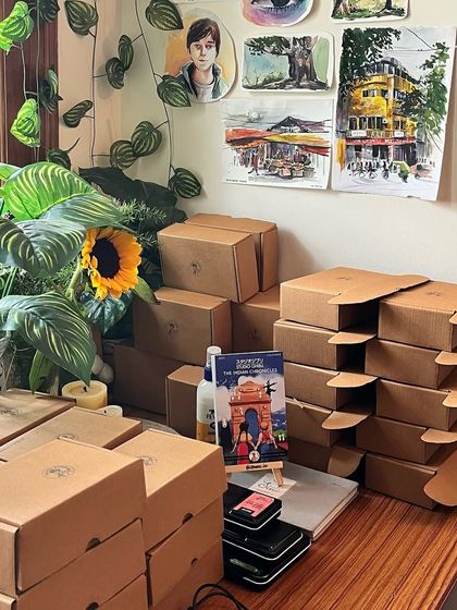 My studio desk, filled with boxes as I prepare to ship out all the calendar orders. It's a beautiful kind of chaos.