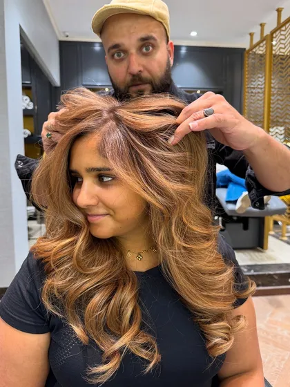 This warm-toned balayage is full of life and dimension, perfect for a sun-kissed look.