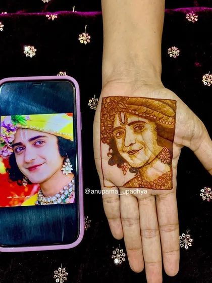 Side-by-side with the reference photo, this shows the likeness I achieved in the portrait mehandi of Sumedh as Krishna.