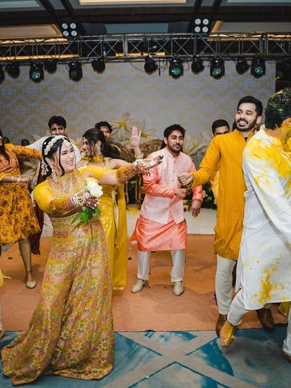 A fun and messy Haldi ceremony, where dancing is a must.