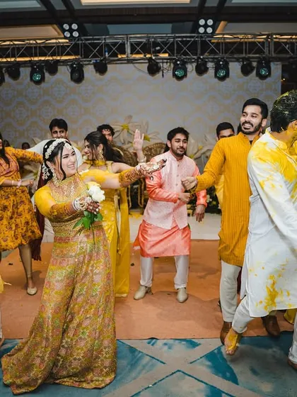 A fun and messy Haldi ceremony, where dancing is a must.