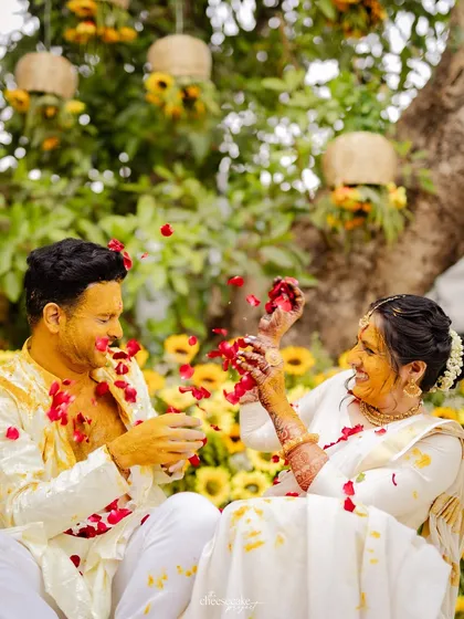 A playful moment between the couple during their sunflower-themed Haldi in Lonavala. It's these sweet interactions I look for.